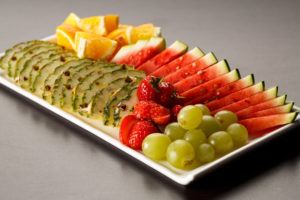 A plate of appetising mixed fruit including pineapple, strawberries, grapes, water melon and orange segments as part of mercure hotels meeting food offering